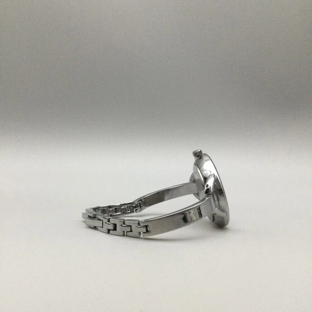 Anne Klein AK/1209 Womens Watch 35mm Silver Tone Black Dial Dress Bangle 6.75
